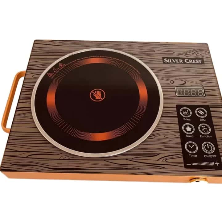 Silver Crest single ceramic stove with a wood-grain glass top, one burner, touch keys and a side handle