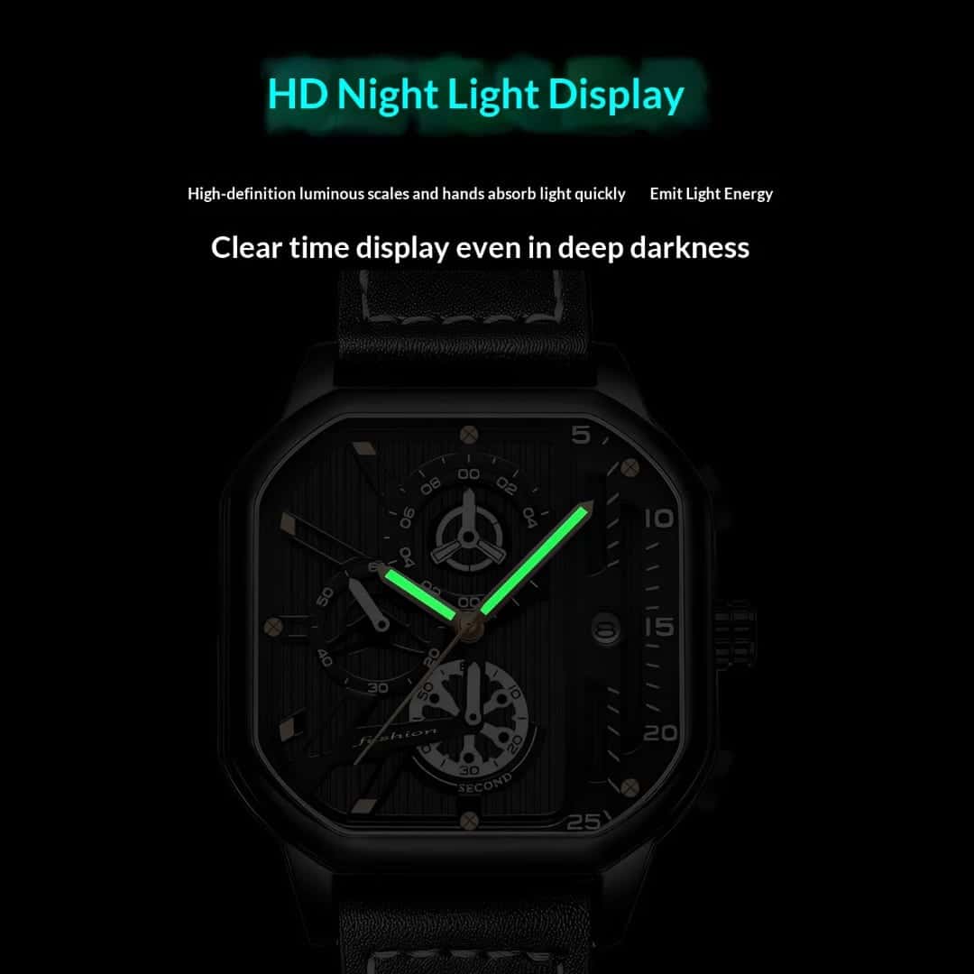 The watch's luminous hands glowing in the dark